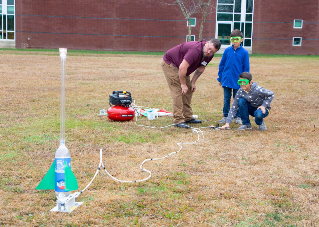 Blast off safely with water-bottle rockets at your next unit event